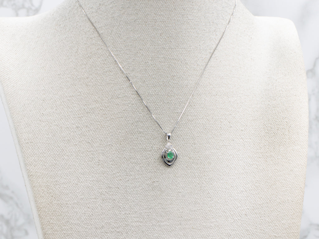 Oval-Cut Emerald and Diamond White Gold Pendant