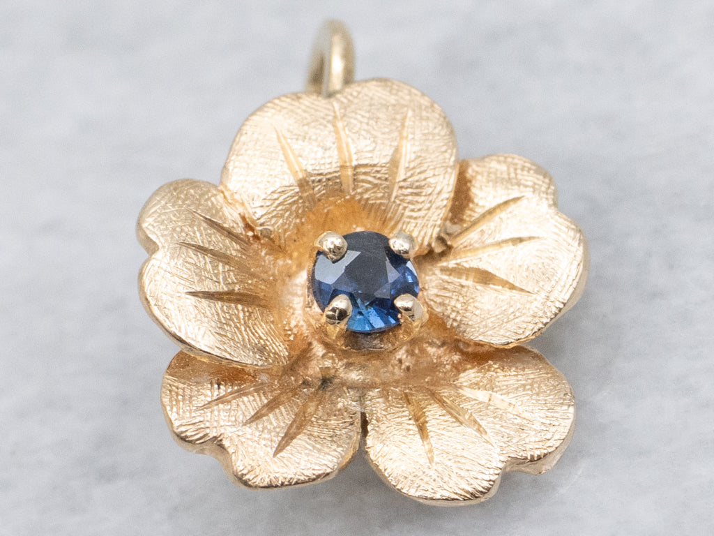 Textured Gold Flower Pendant with Sapphire Center