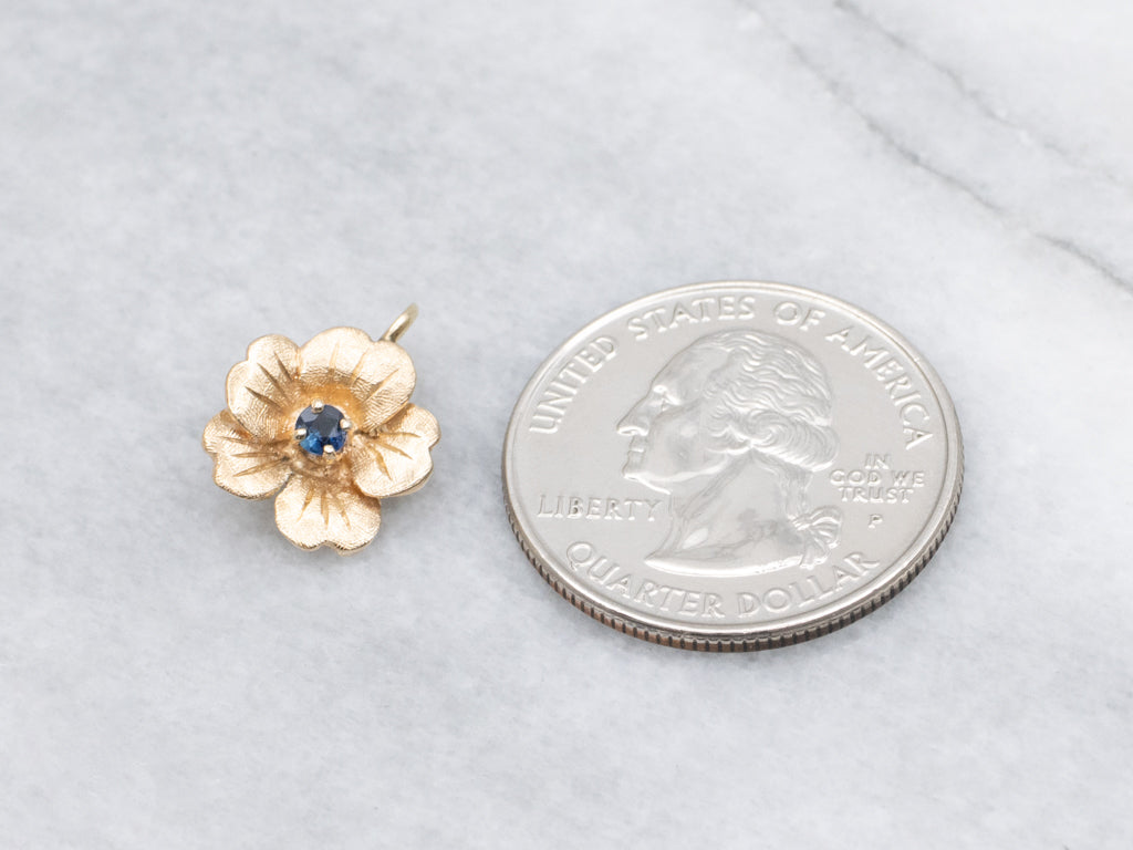 Textured Gold Flower Pendant with Sapphire Center