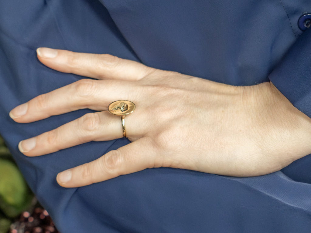 Antique Oval-Top Gold Signet Ring with Engraved Crest