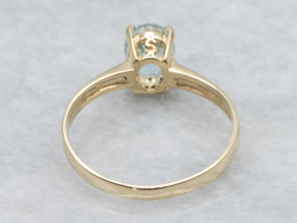 Oval-Cut Aquamarine Yellow Gold Solitaire Ring