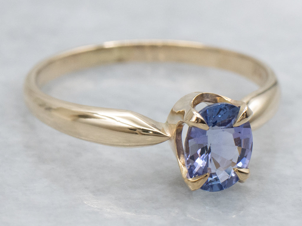 Oval-Cut Tanzanite Yellow Gold Solitaire Ring
