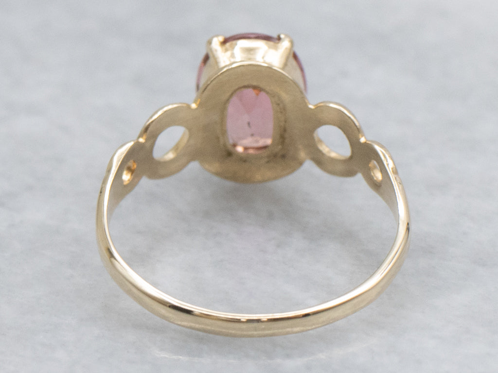 Pink Tourmaline in Looping Gold Solitaire Ring