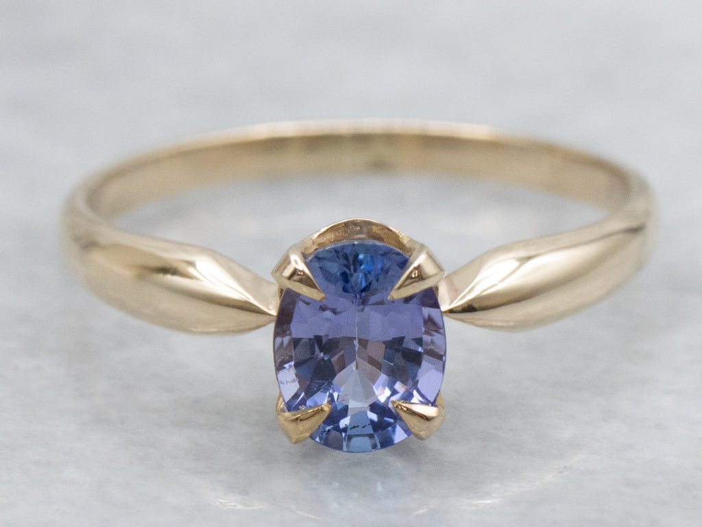 Oval-Cut Tanzanite Yellow Gold Solitaire Ring