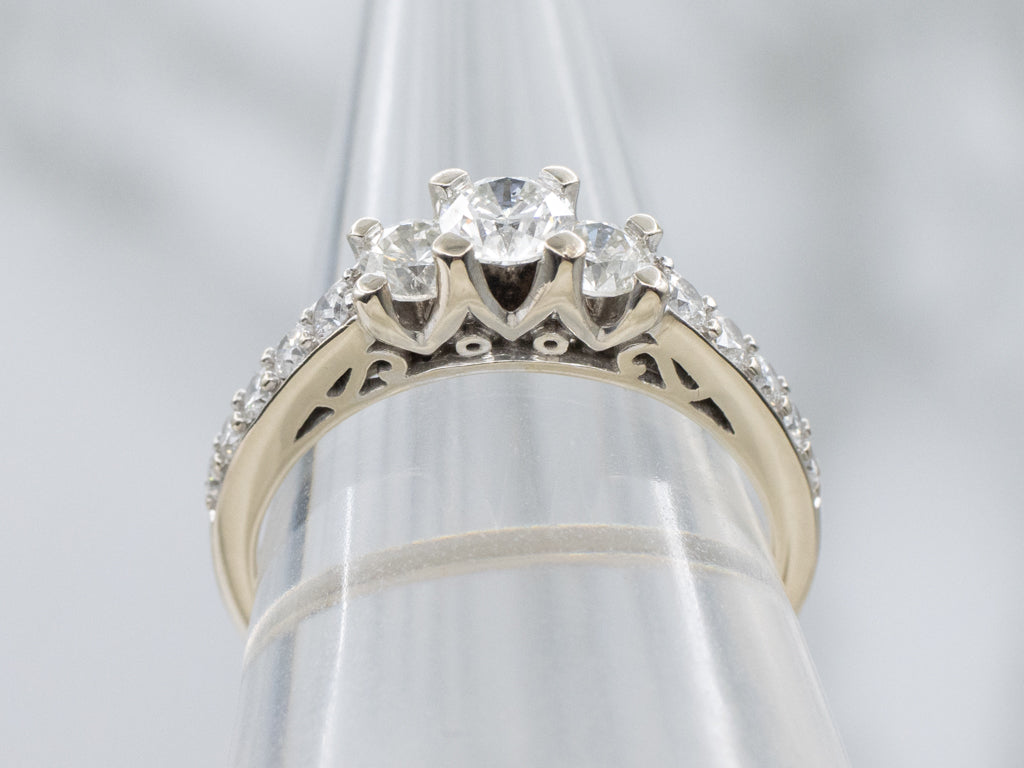 Modern Round Brilliant Three Stone Diamond Engagement Ring with Diamond Accents