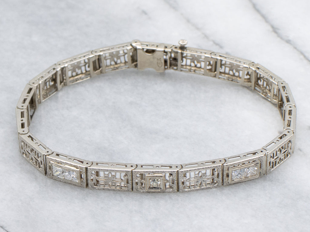 1920s Floral Filigree White Gold and Diamond Link Bracelet