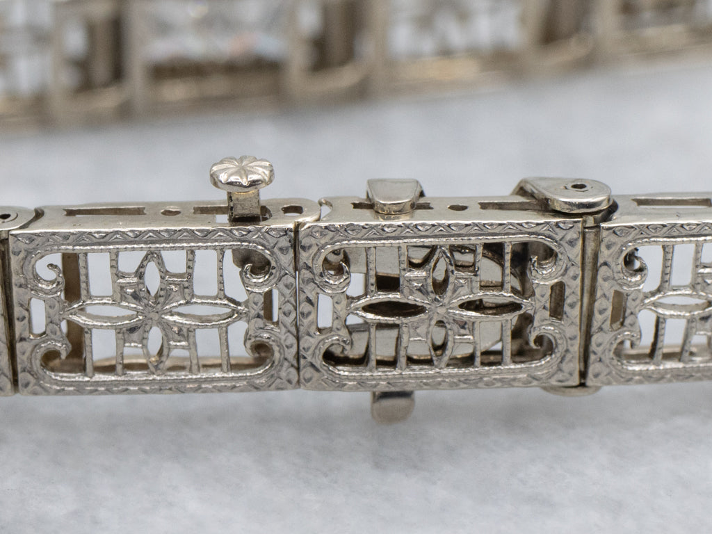 1920s Floral Filigree White Gold and Diamond Link Bracelet