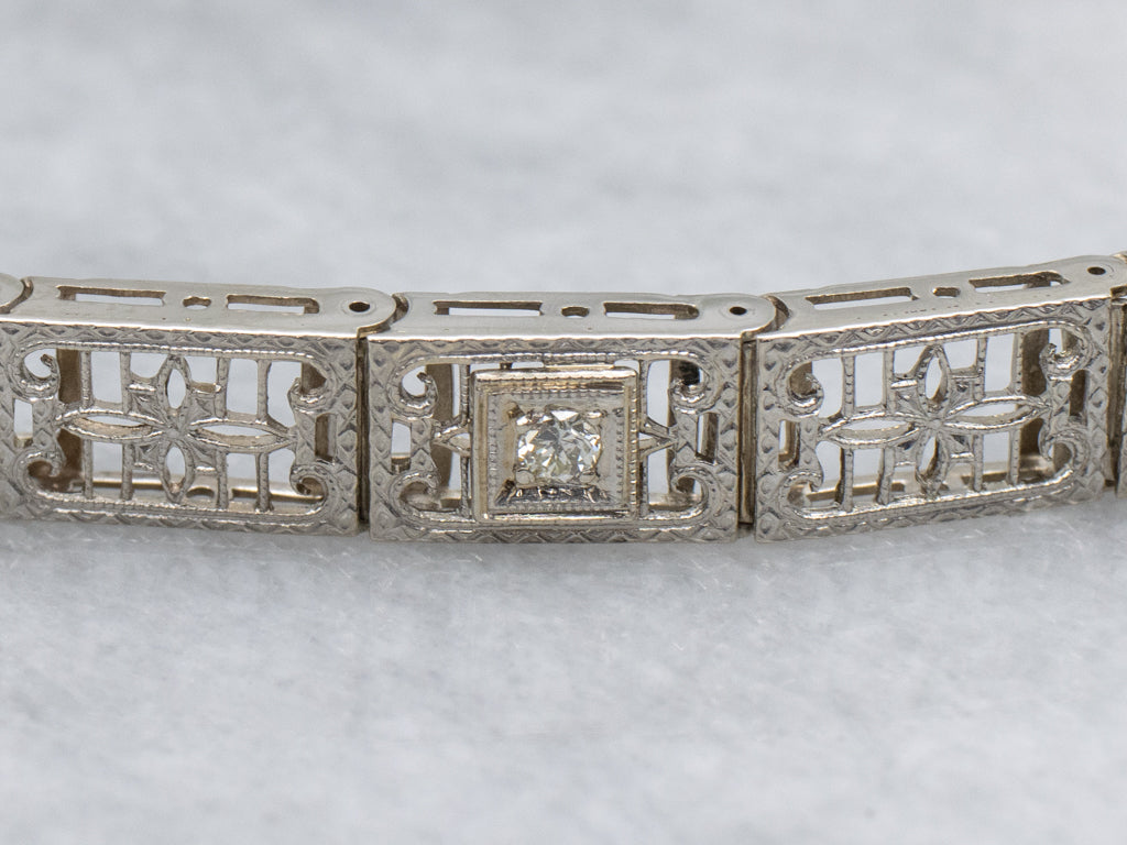 1920s Floral Filigree White Gold and Diamond Link Bracelet