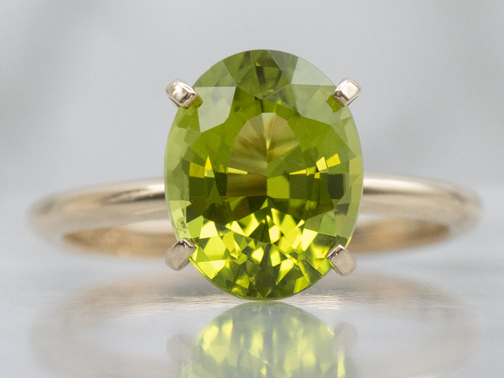 Oval-Cut Peridot Yellow Gold Solitaire Ring