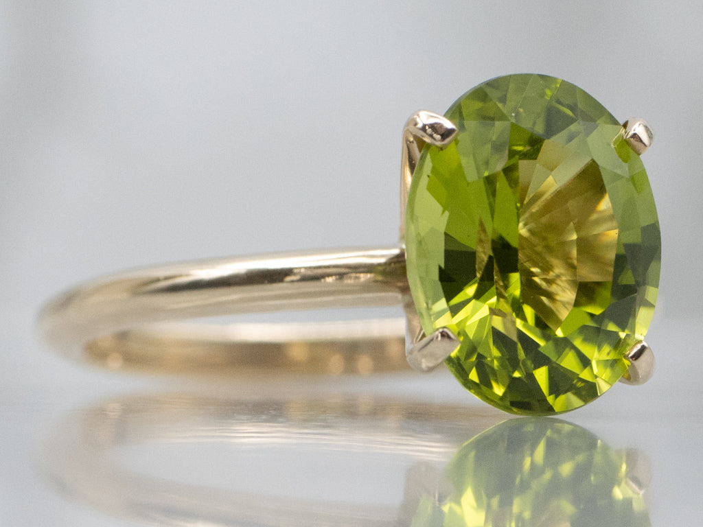 Oval-Cut Peridot Yellow Gold Solitaire Ring