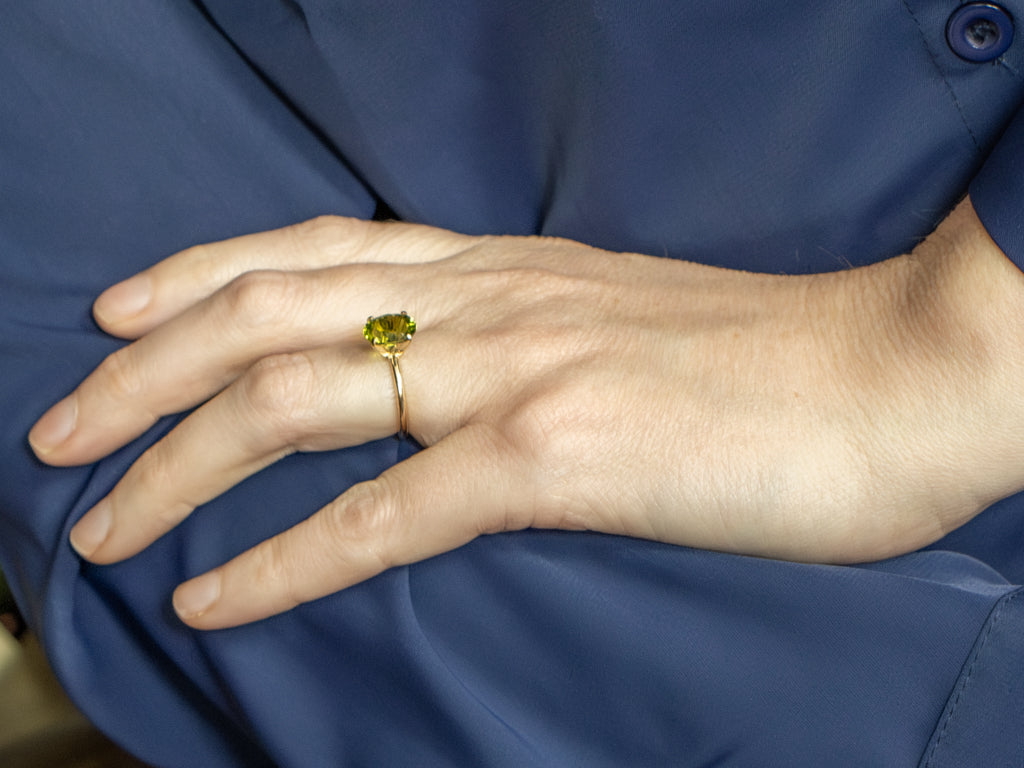 Oval-Cut Peridot Yellow Gold Solitaire Ring