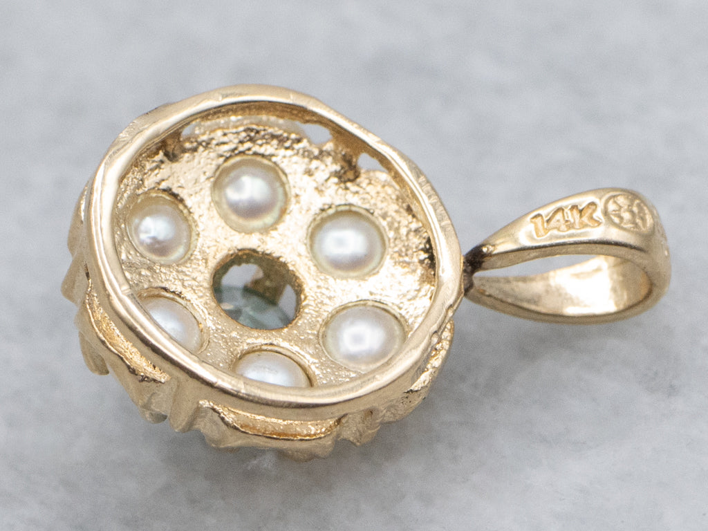 Pretty Blue Zircon and Pearl Halo Gold Pendant