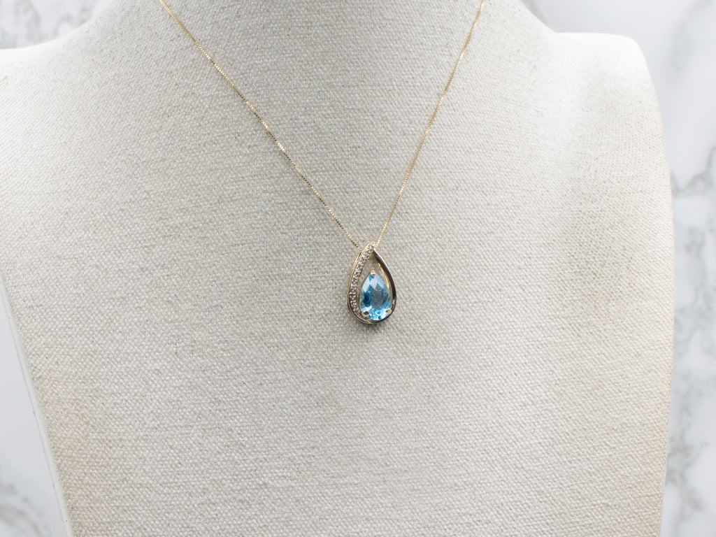 Modern Pear-Cut Blue Topaz and Diamond Teardrop Gold Pendant