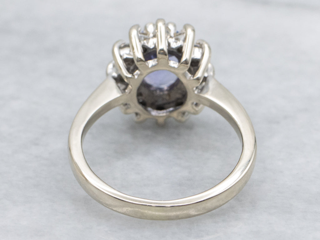 White Gold Tanzanite and Diamond Halo Ring