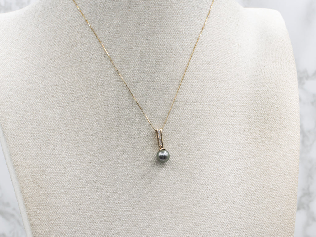 Black Pearl and Diamond Drop Pendant in Yellow Gold