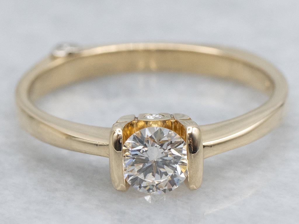 Modern Gold Tension-Set Diamond Engagement Ring with Diamond Accents