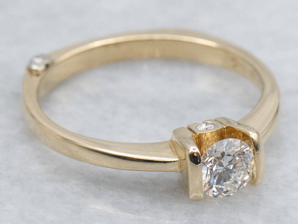 Modern Gold Tension-Set Diamond Engagement Ring with Diamond Accents