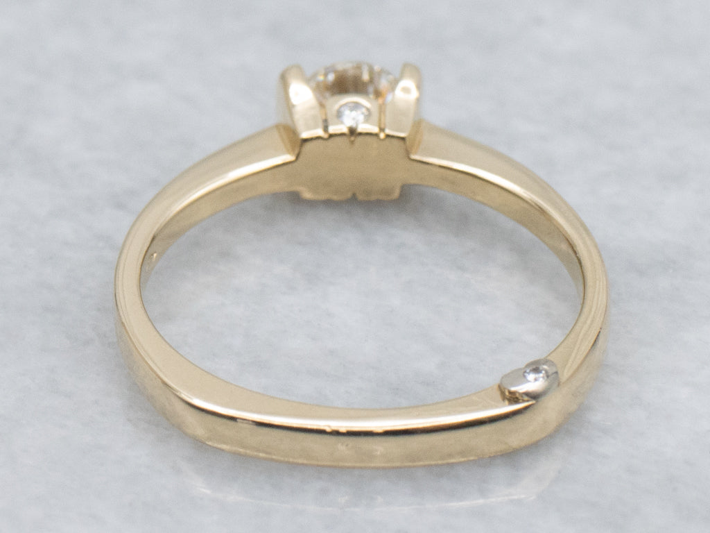 Modern Gold Tension-Set Diamond Engagement Ring with Diamond Accents