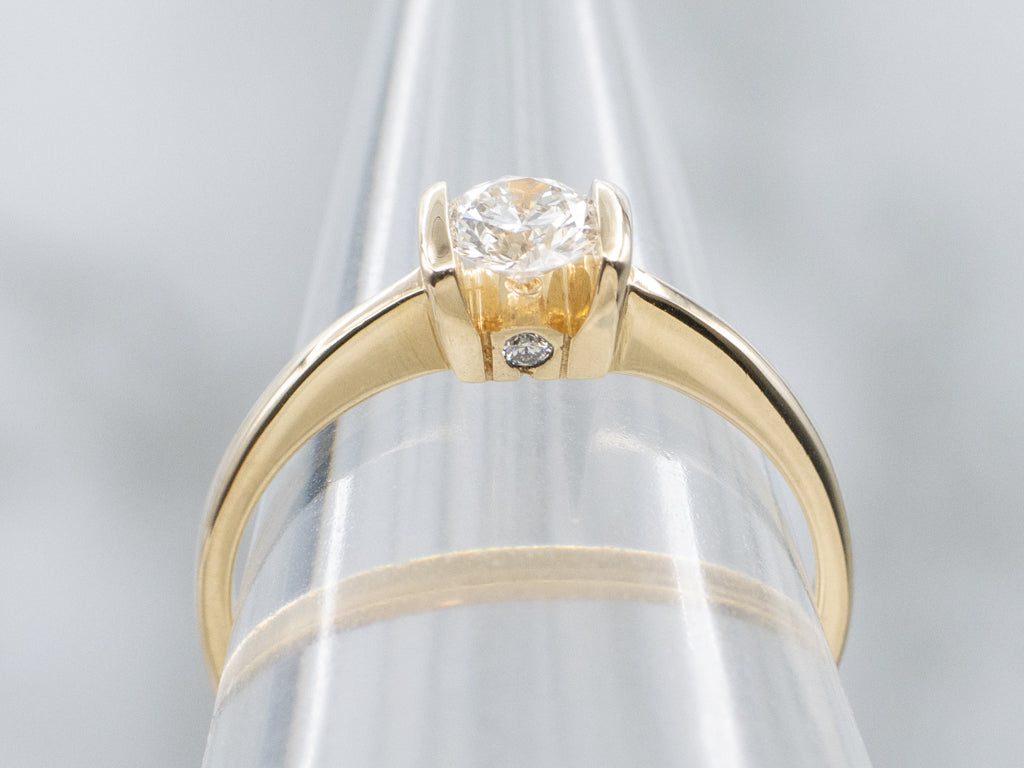 Modern Gold Tension-Set Diamond Engagement Ring with Diamond Accents