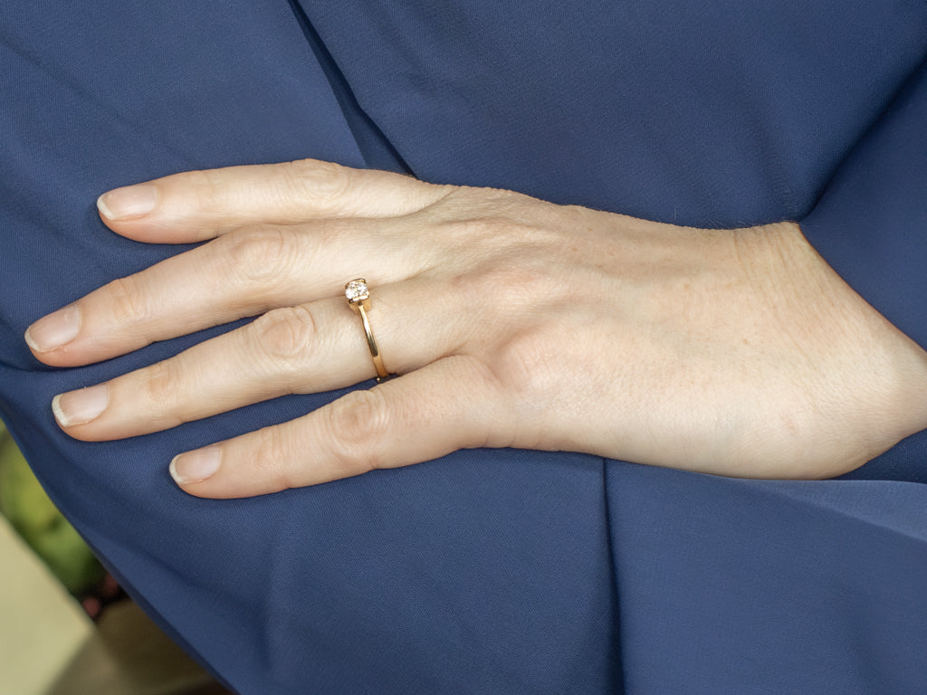 Modern Gold Tension-Set Diamond Engagement Ring with Diamond Accents