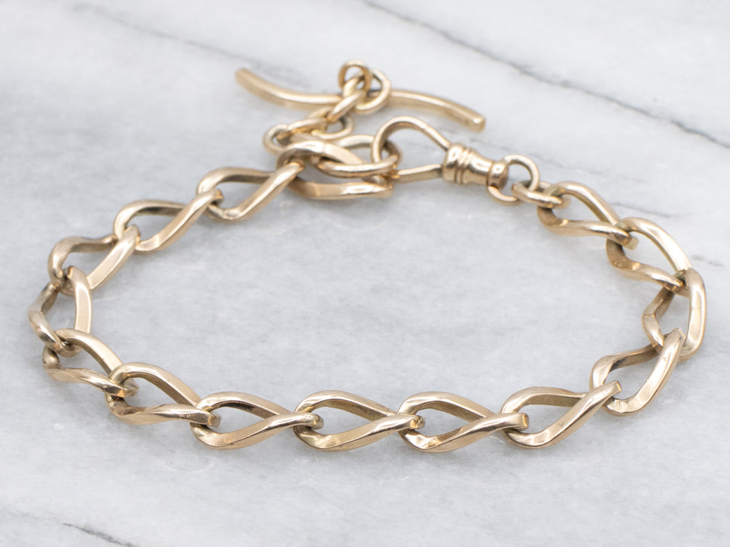 Vintage Gold Curb-Link Bracelet with Curved T-Bar Drop