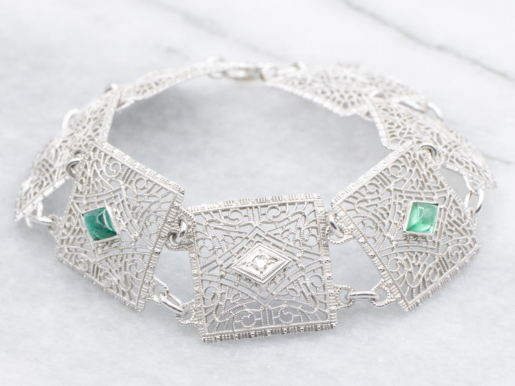 Art Deco Era Diamond and Emerald Doublet Floral Filigree Panel Link Bracelet