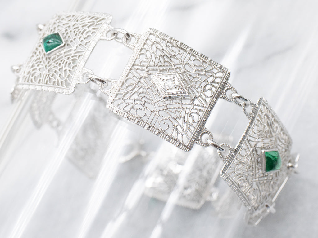 Art Deco Era Diamond and Emerald Doublet Floral Filigree Panel Link Bracelet