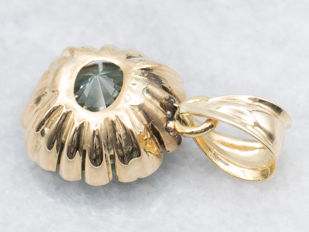 Blue Zircon Solitaire Pendant in Scalloped Gold Setting