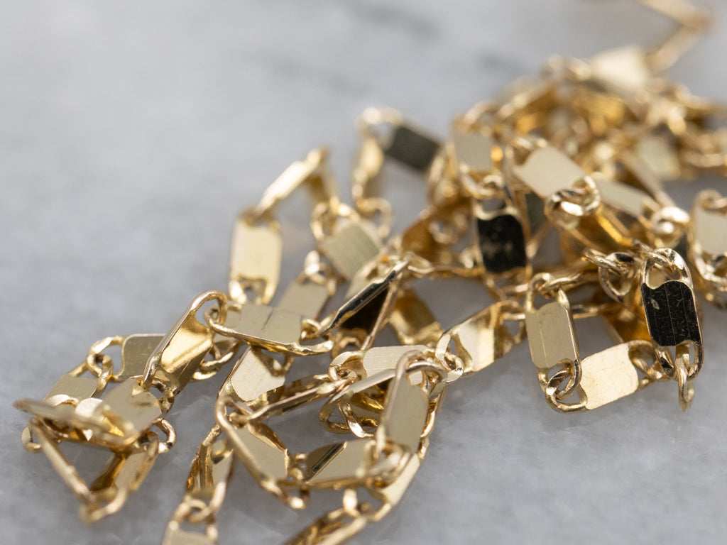 Mix-Era Graduated Diamond Twist Pendant and Gold Link Necklace