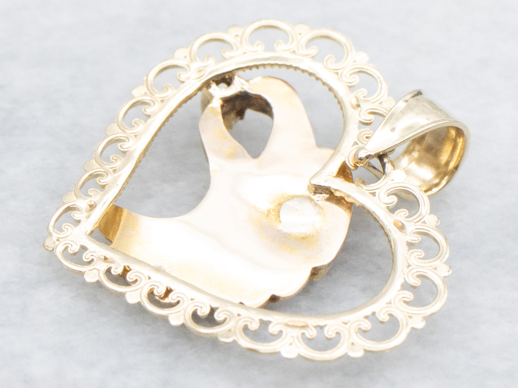 Gold Eagle and Heart Diamond Pendant with Garnet Eye