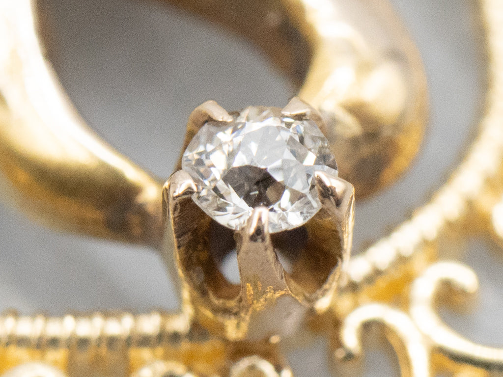 Gold Eagle and Heart Diamond Pendant with Garnet Eye