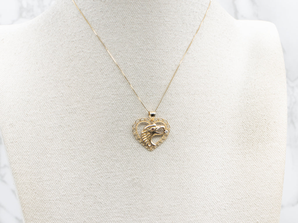 Gold Eagle and Heart Diamond Pendant with Garnet Eye