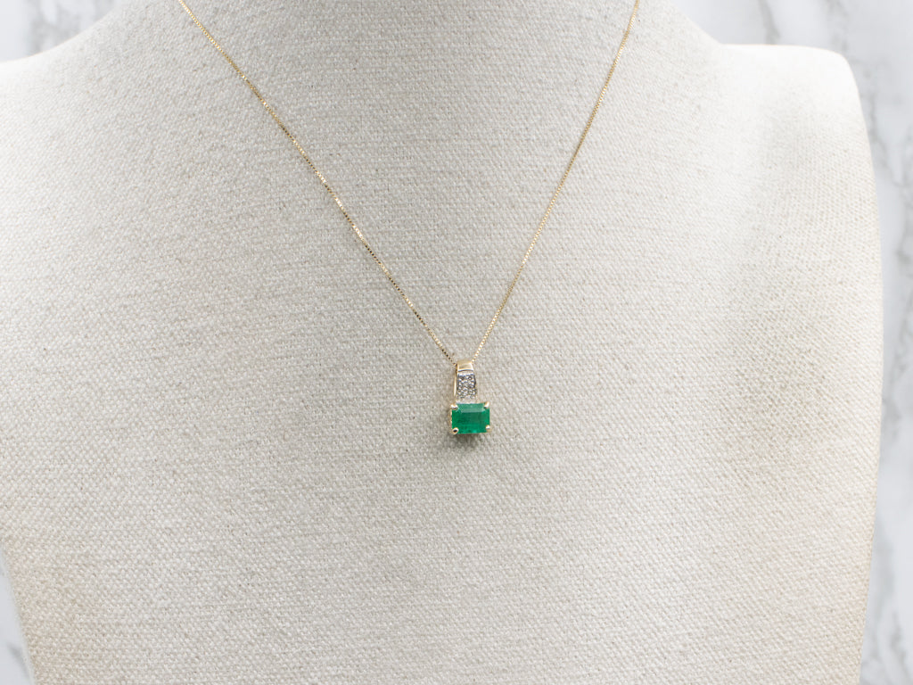 Modern Gold East-to-West Set Emerald and Diamond Pendant