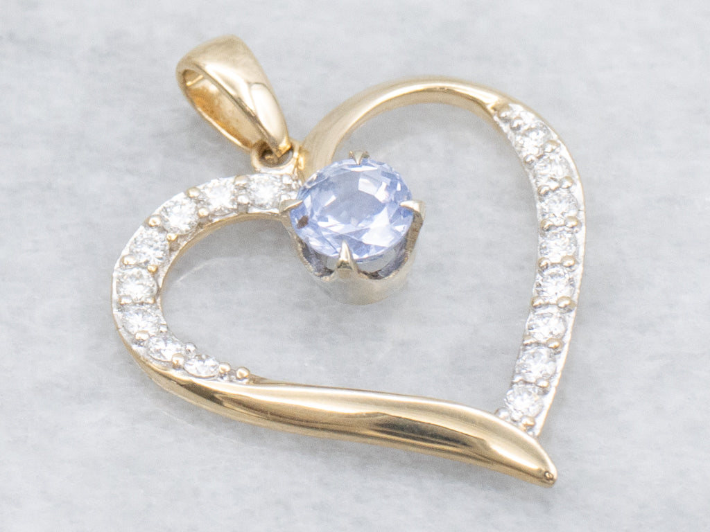 Diamond Heart Pendant with Swinging Sapphire Center