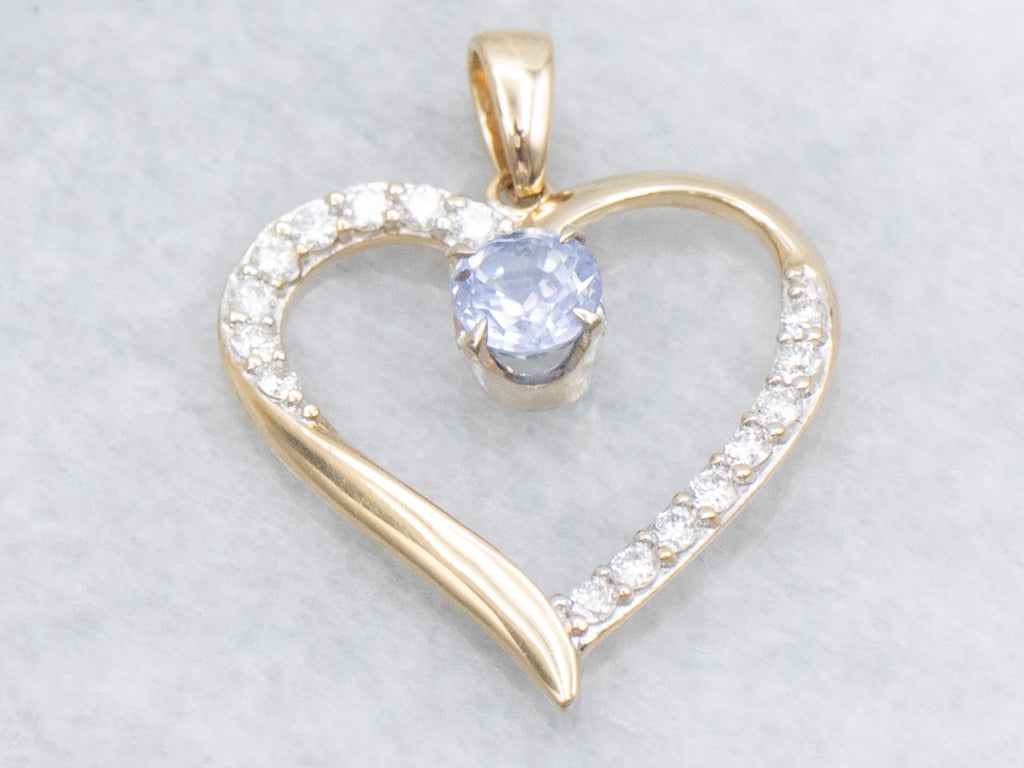 Diamond Heart Pendant with Swinging Sapphire Center