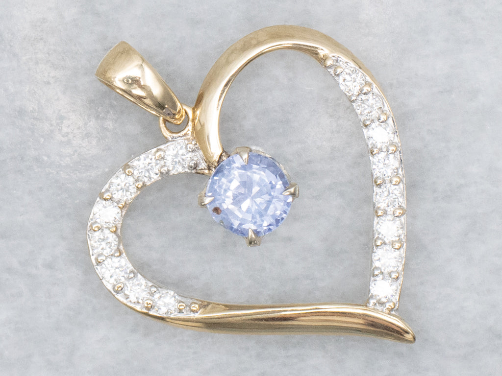 Diamond Heart Pendant with Swinging Sapphire Center