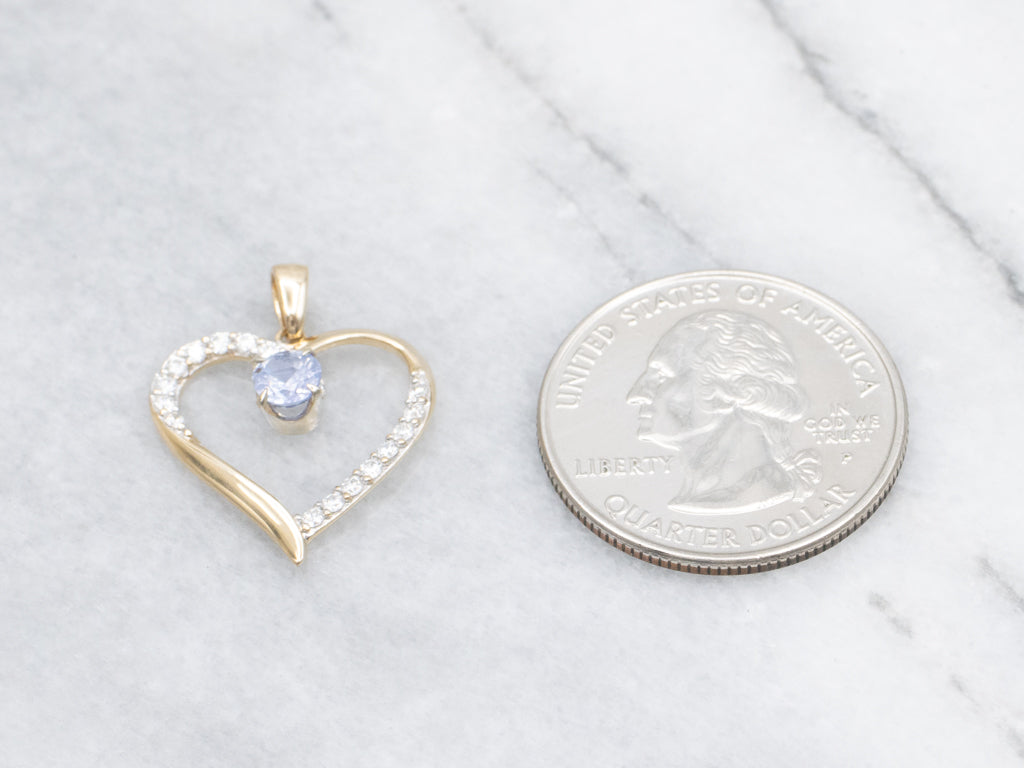 Diamond Heart Pendant with Swinging Sapphire Center