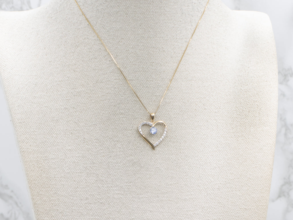 Diamond Heart Pendant with Swinging Sapphire Center
