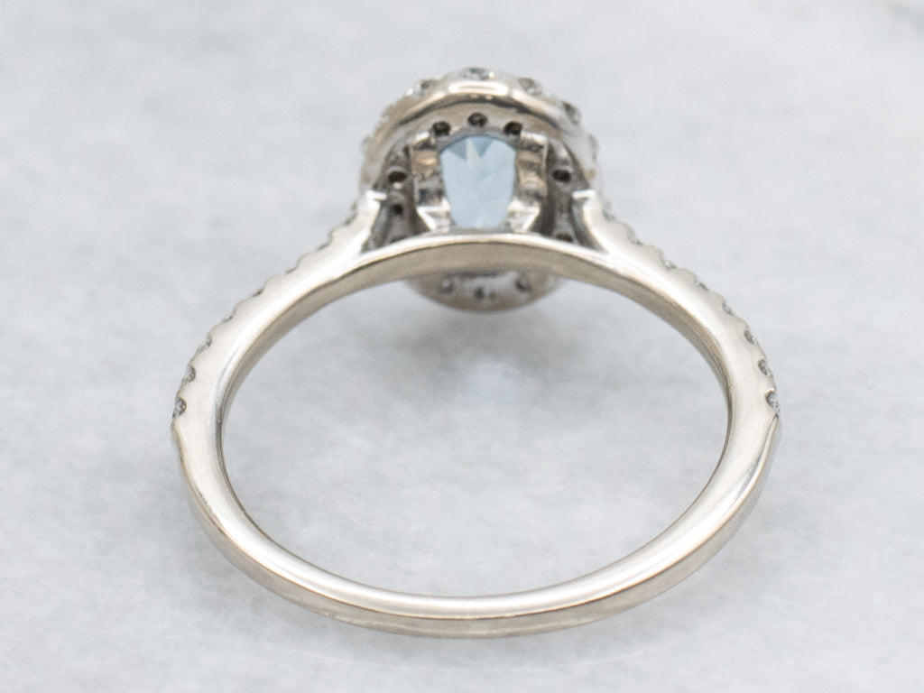 Modern Aquamarine and Diamond Halo White Gold Ring
