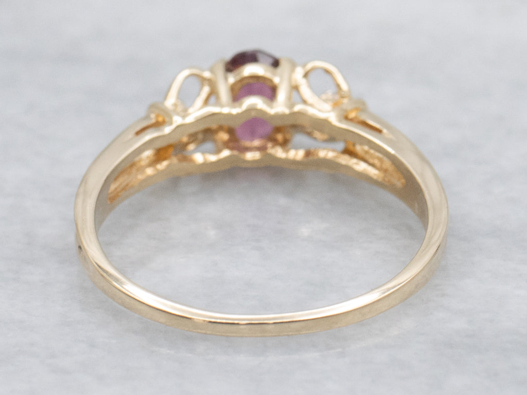 Yellow Gold Rhodolite Garnet and Diamond Three Stone Ring