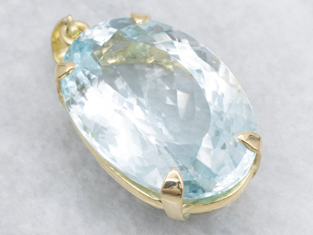 Oversized Blue Topaz and Gold Cocktail Pendant
