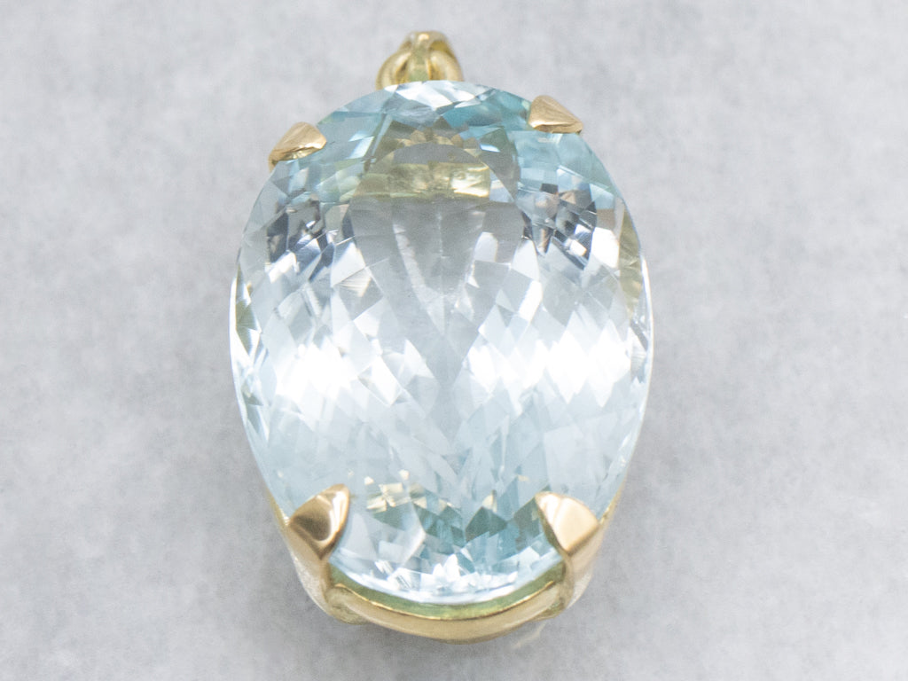 Oversized Blue Topaz and Gold Cocktail Pendant