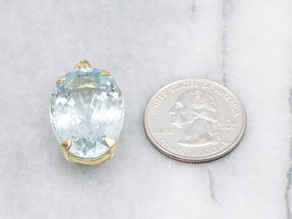 Oversized Blue Topaz and Gold Cocktail Pendant