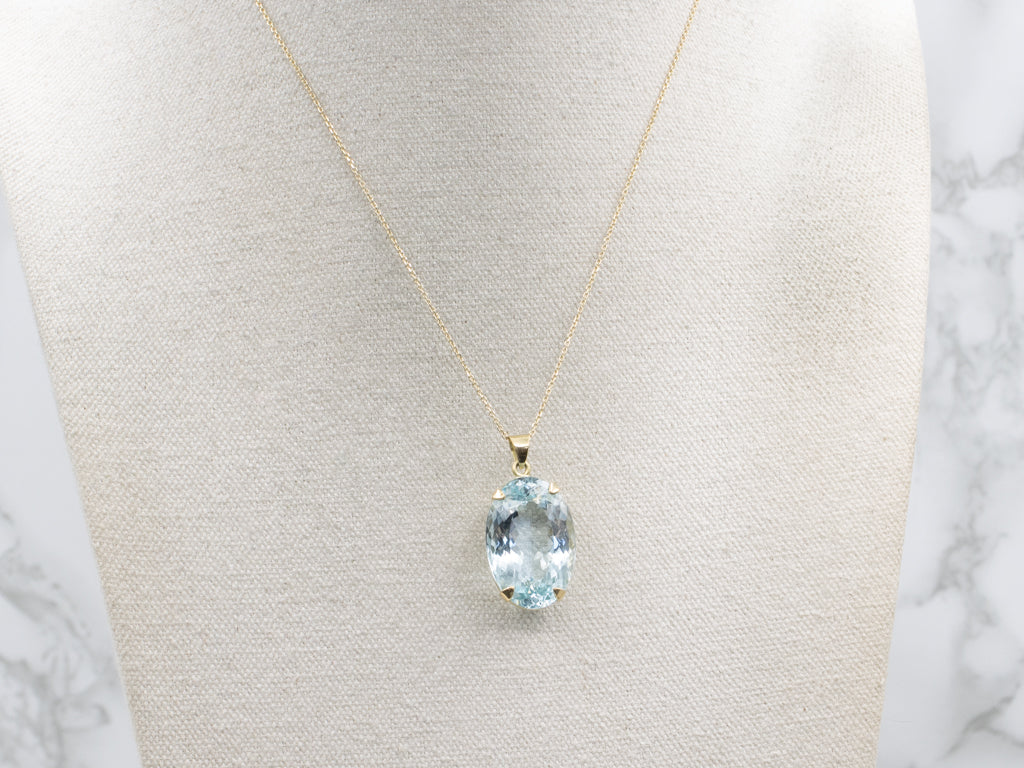 Oversized Blue Topaz and Gold Cocktail Pendant