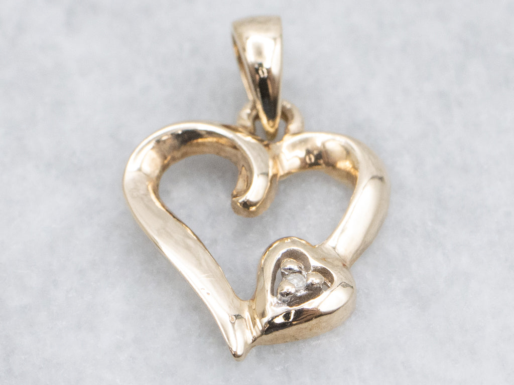 Looping Yellow Gold Diamond Heart Pendant