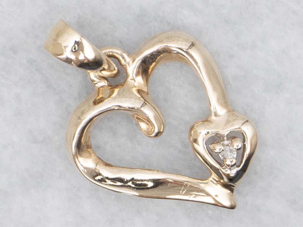 Looping Yellow Gold Diamond Heart Pendant
