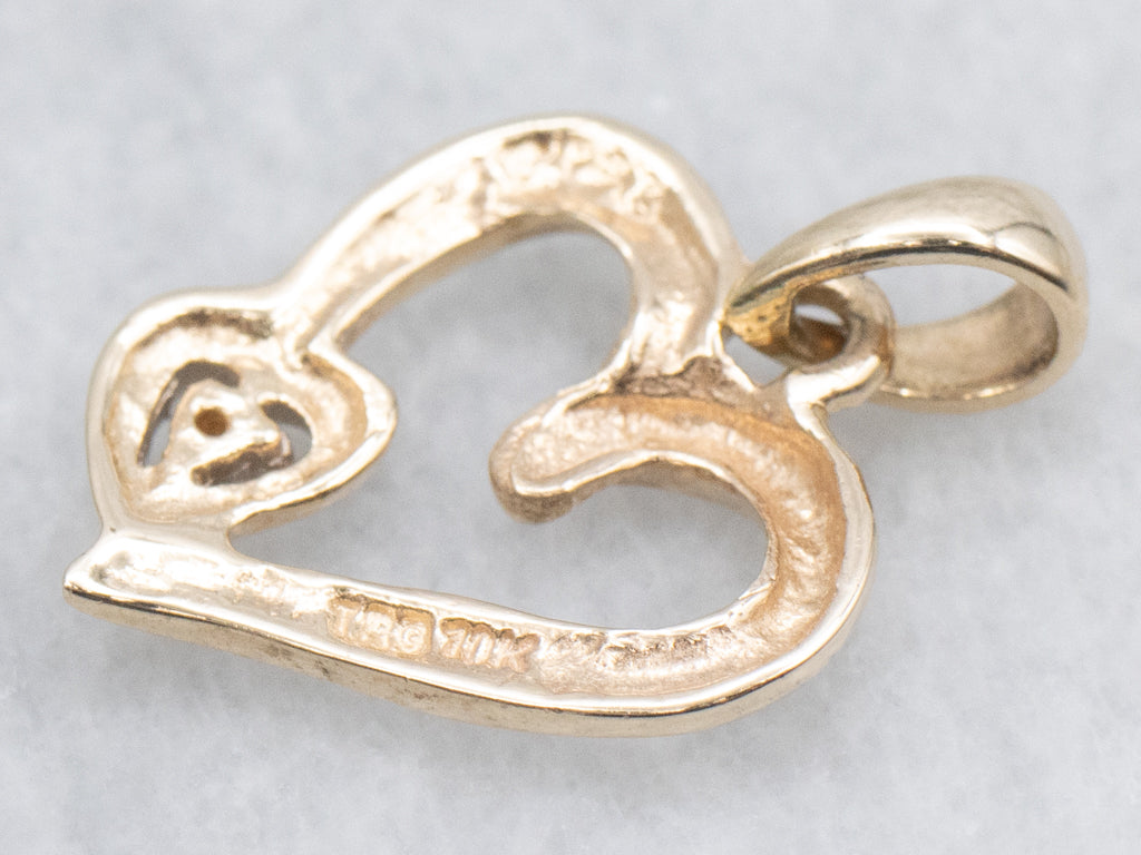 Looping Yellow Gold Diamond Heart Pendant