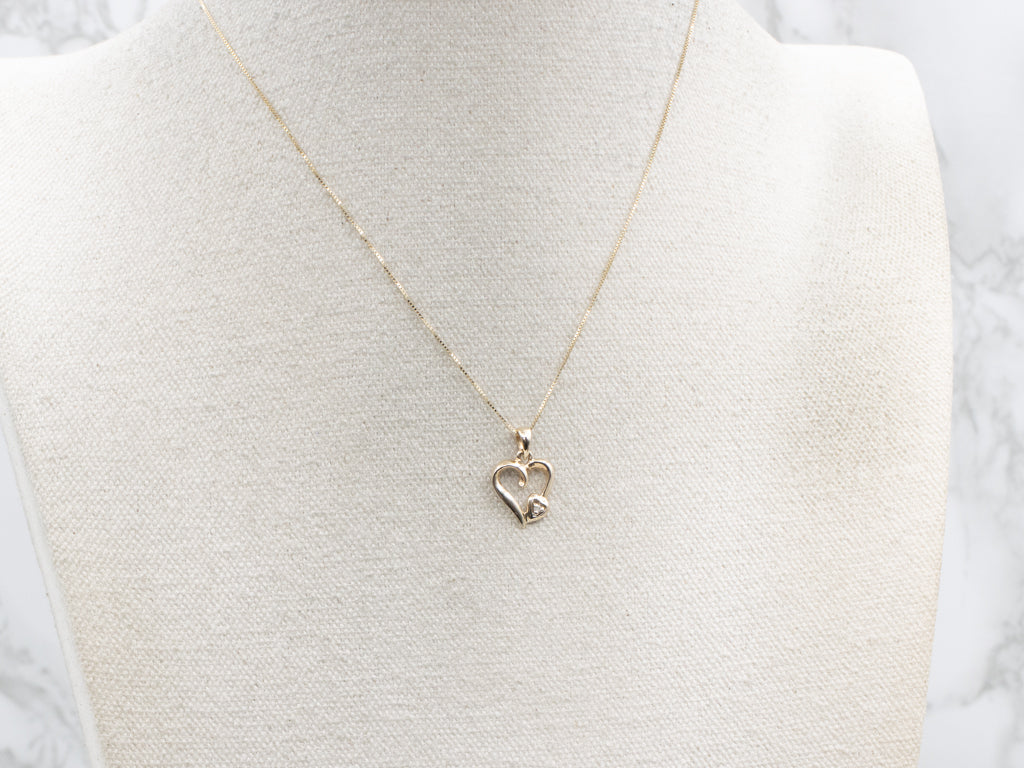 Looping Yellow Gold Diamond Heart Pendant