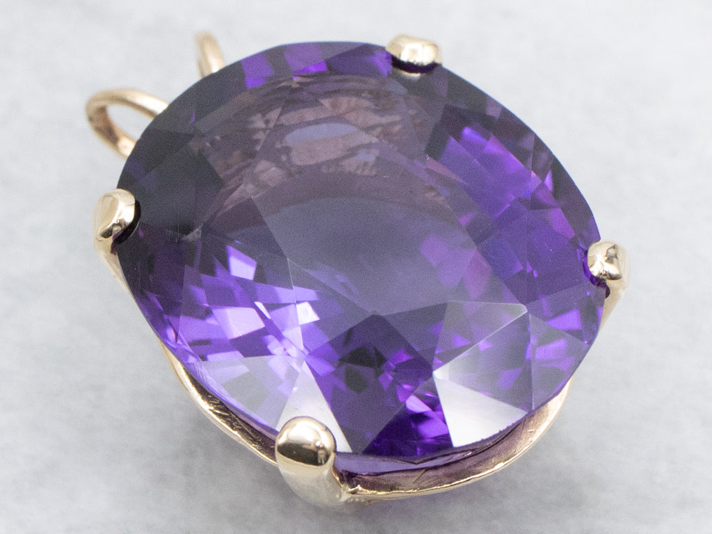 Four-Prong Oval-Cut Amethyst and Gold Cocktail Pendant