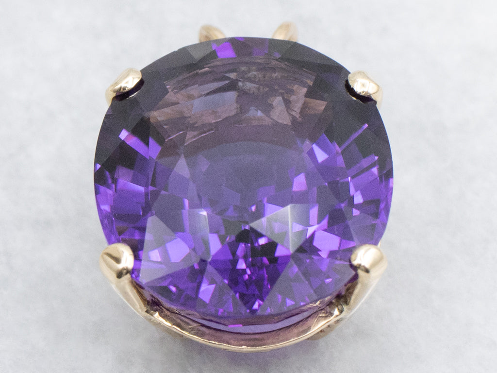 Four-Prong Oval-Cut Amethyst and Gold Cocktail Pendant